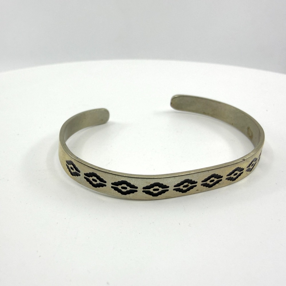 Southwestern Silver Tone Cuff Bracelet with Black Geometric Pattern